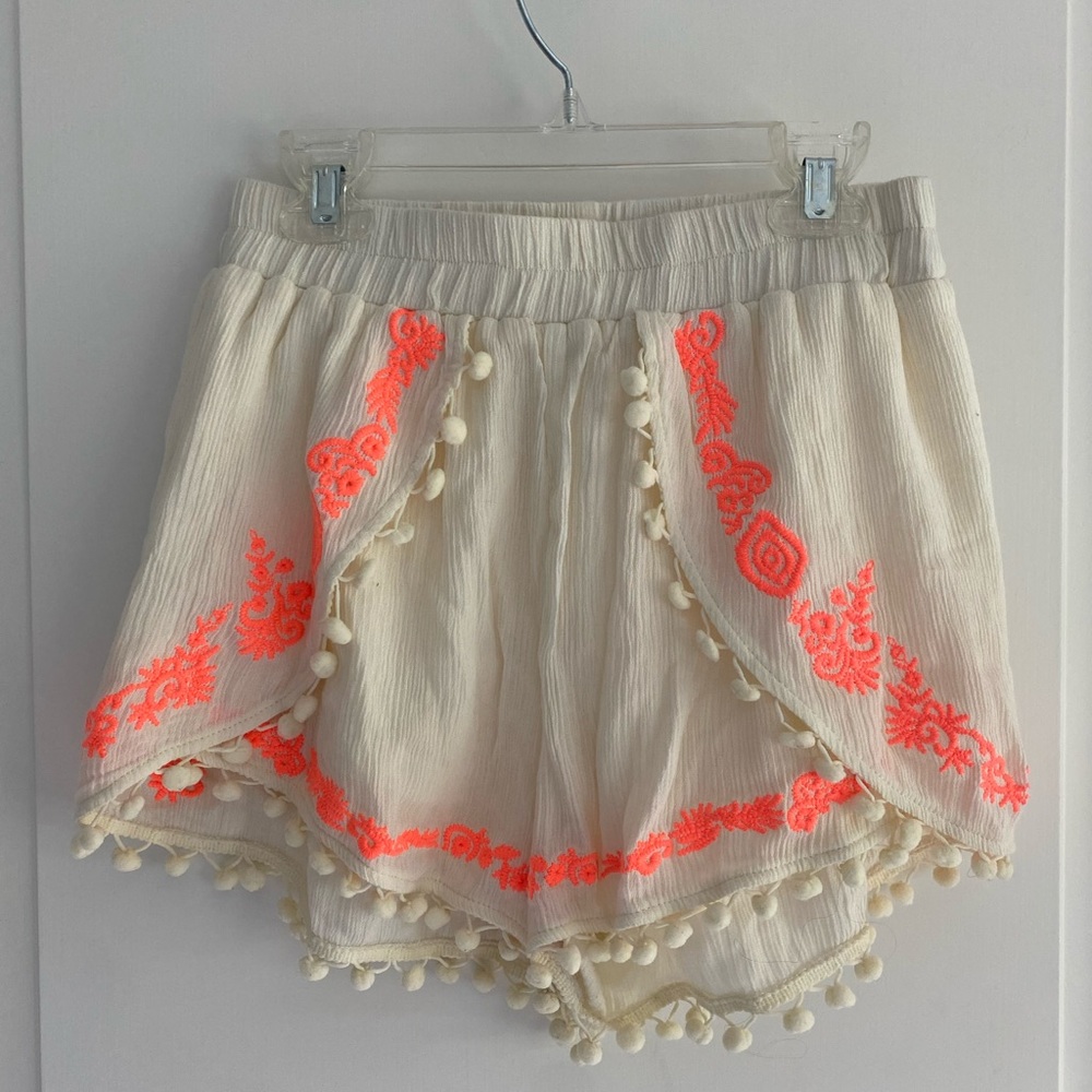 A. PEACH flowy shorts with pompoms size S